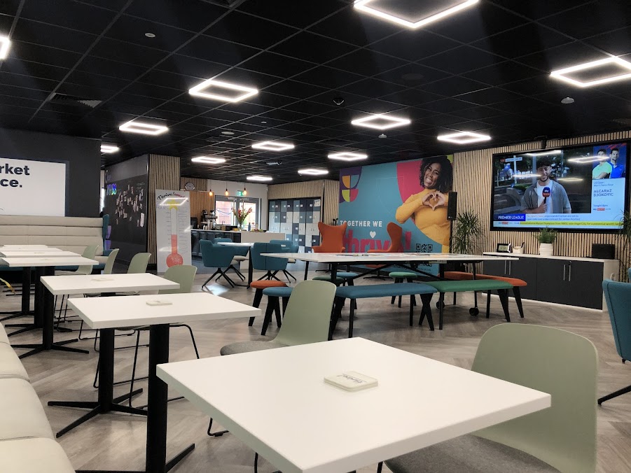 To the left of the reception desk there is a door that takes you into the main, open plan room. The room looks like this.